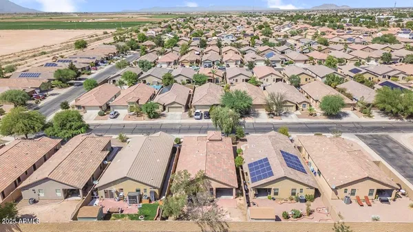 an aerial view of residential building with parking space