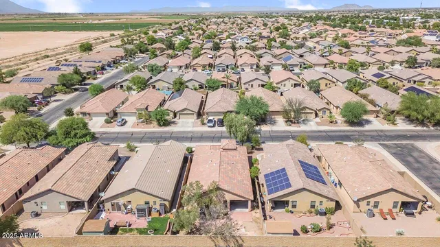 an aerial view of residential building with parking space