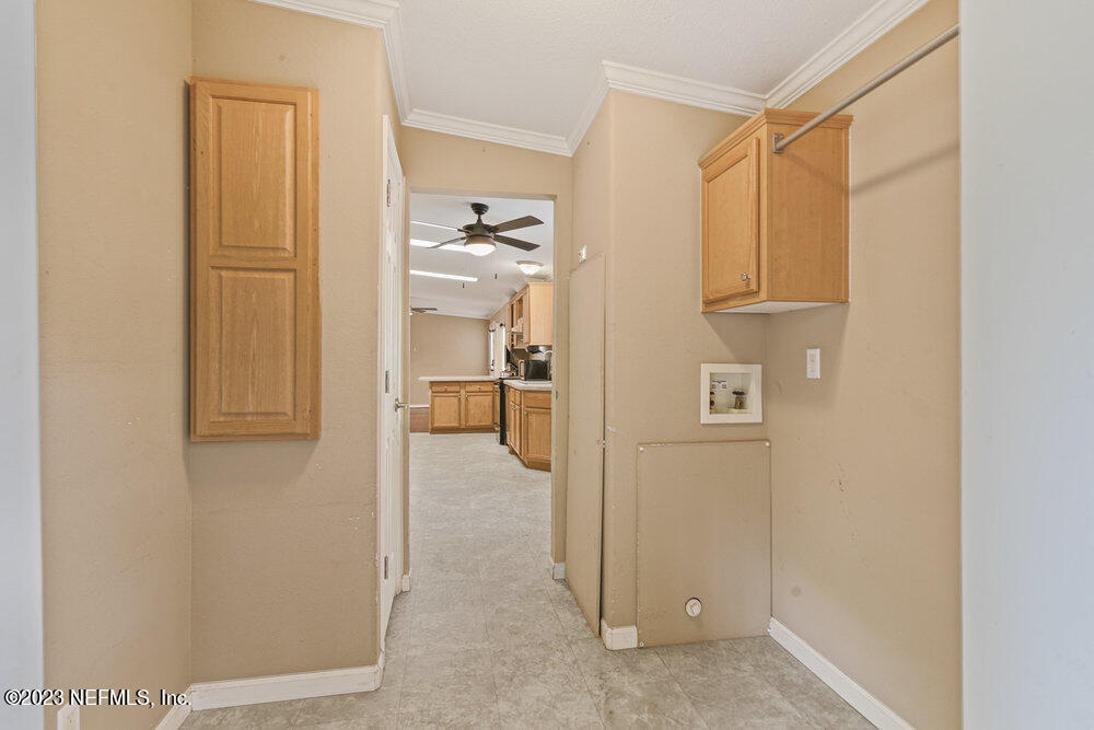 18066 Wells Road Jacksonville, FL 32234 - Photo 16 of 50 a view of a kitchen with a sink