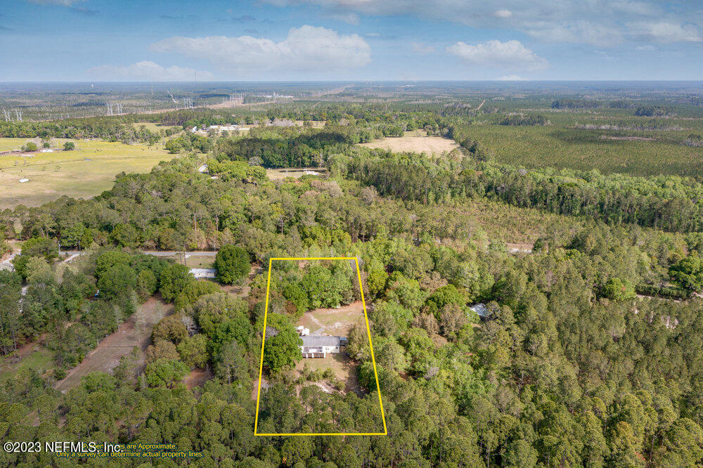 18066 Wells Road Jacksonville, FL 32234 - Photo 3 of 50 a view of a city with an ocean