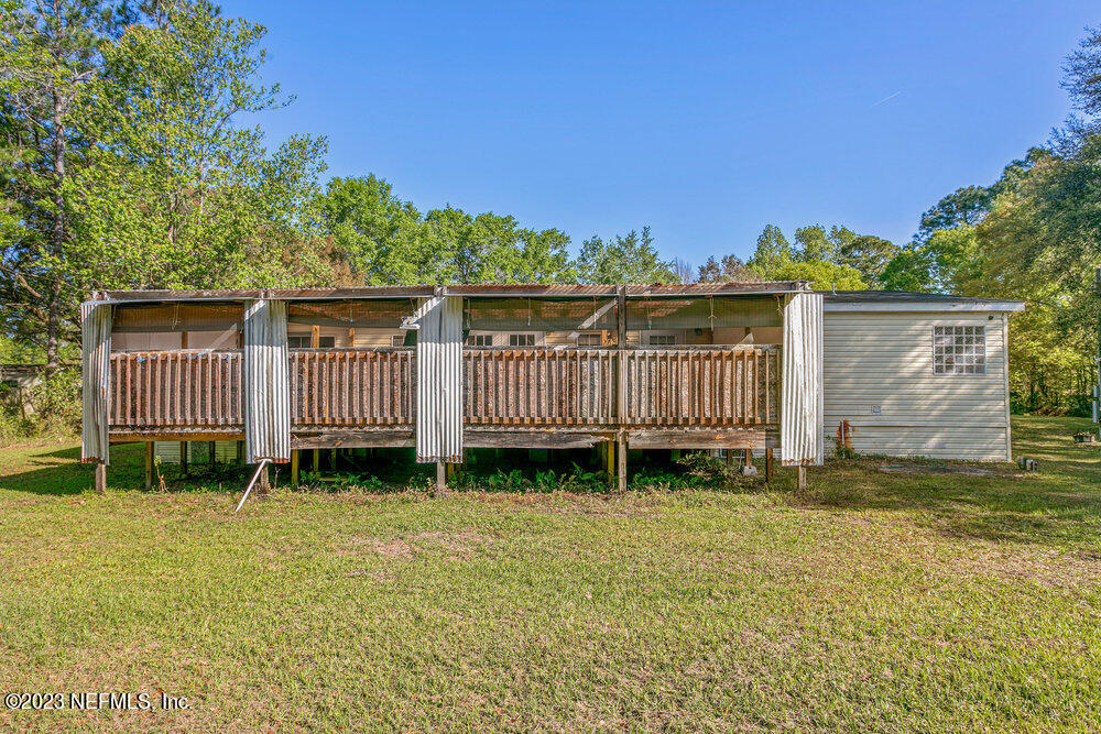 18066 Wells Road Jacksonville, FL 32234 - Photo 37 of 50 a view of backyard with green space