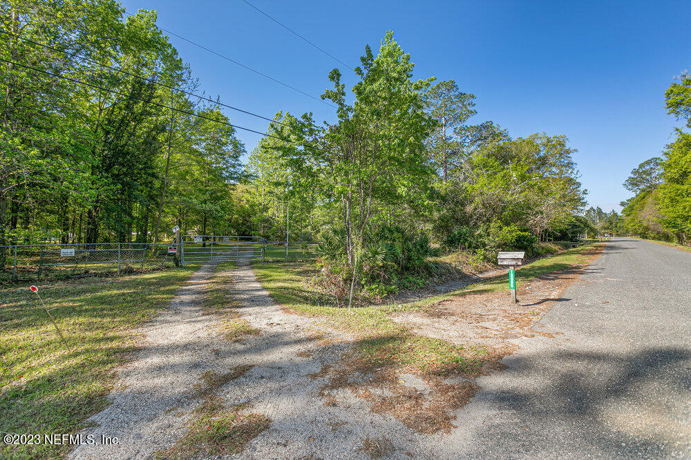 18066 Wells Road Jacksonville, FL 32234 - Photo 4 of 50 a view of a park with large trees