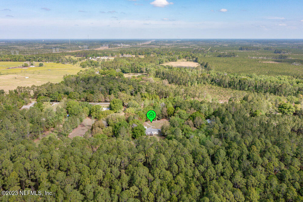 18066 Wells Road Jacksonville, FL 32234 - Photo 41 of 50 a view of an ocean and a mountain