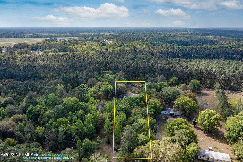 18066 Wells Road Jacksonville, FL 32234 - Photo 44 of 50 an aerial view of mountain with trees