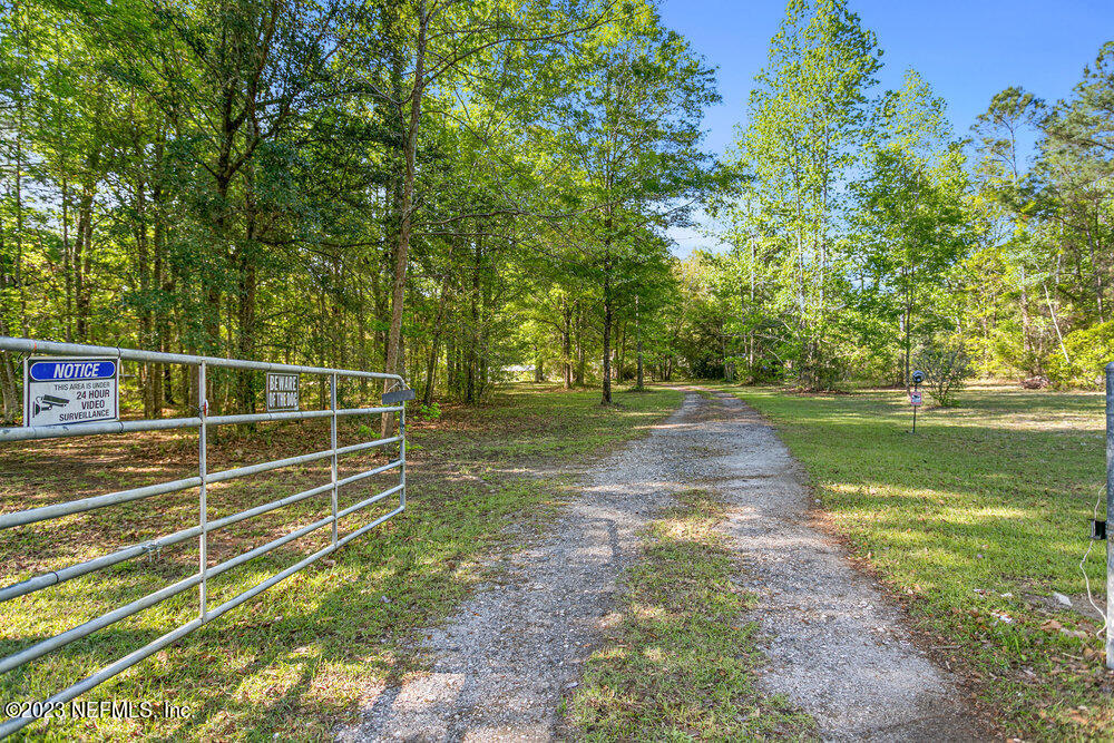 18066 Wells Road Jacksonville, FL 32234 - Photo 6 of 50 a view of a backyard with water fountain