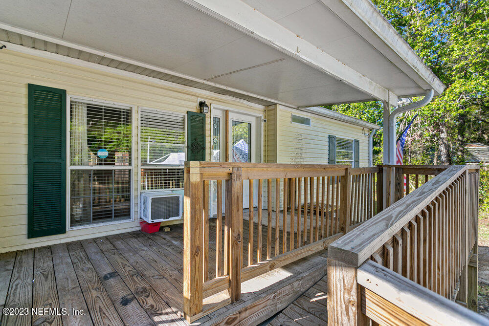 18066 Wells Road Jacksonville, FL 32234 - Photo 9 of 50 a view of a house with a porch