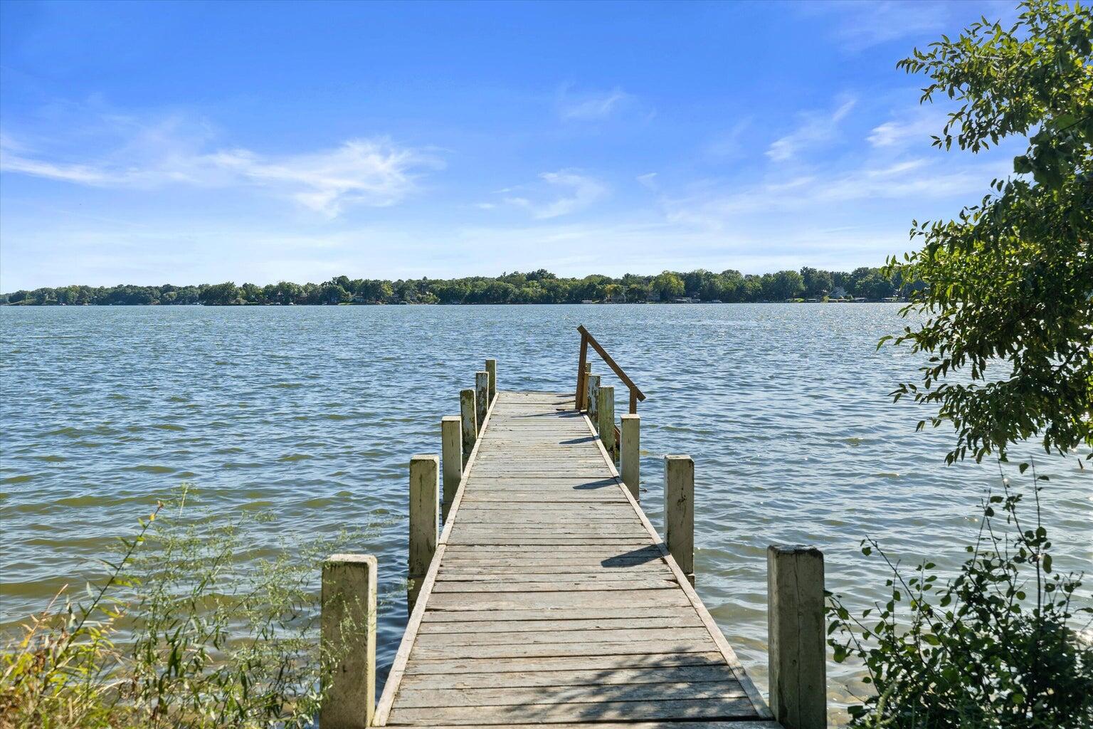 W343N6205 South Bayview Road, Unit LT2 Oconomowoc, WI 53066 - Photo 2 of 14 255 feet of prime lake frontage on the Gold Coast of Okauchee Lake