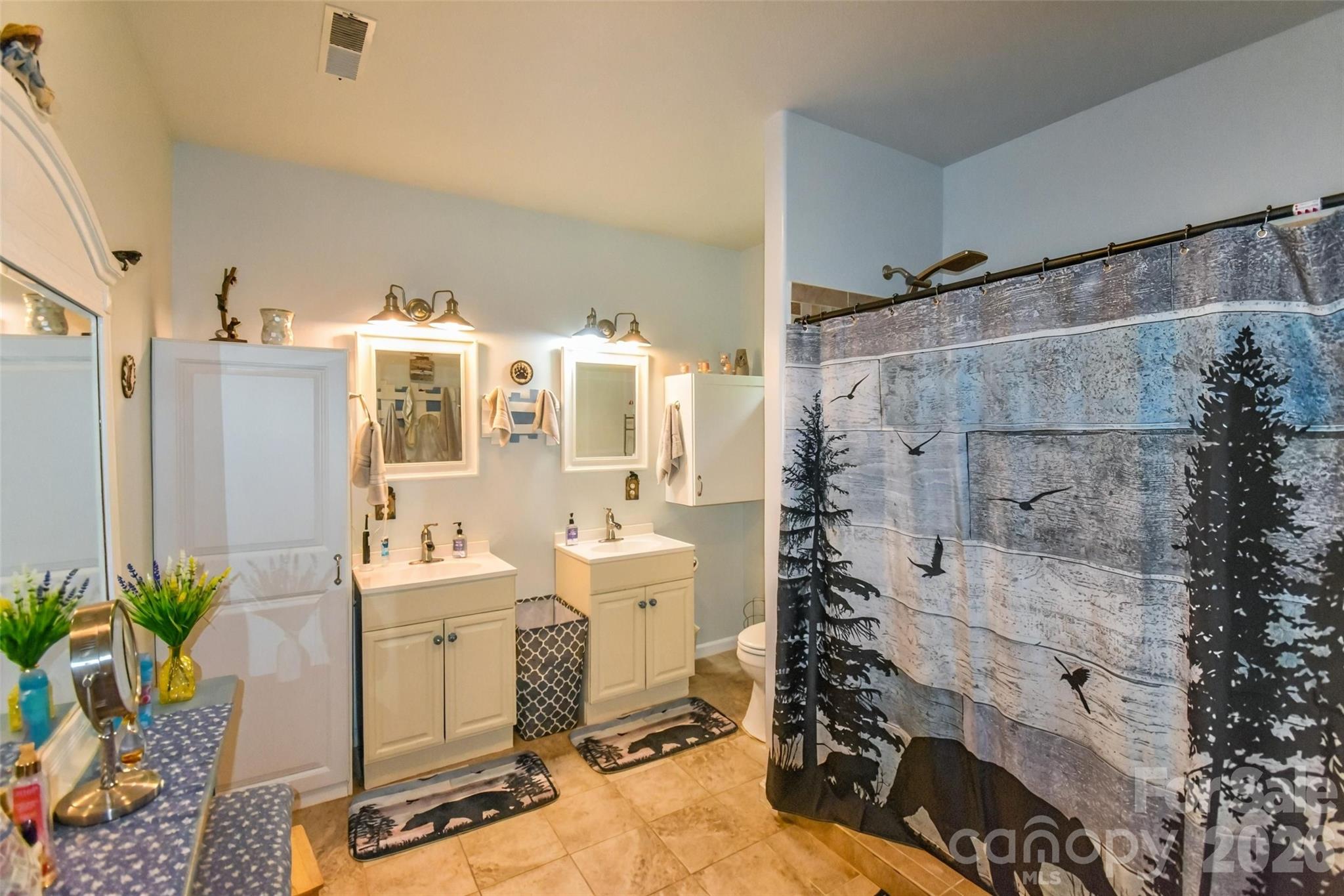 945 North Country Club Road Brevard, NC 28712 - Photo 28 of 42 a bathroom with a bathtub and shower