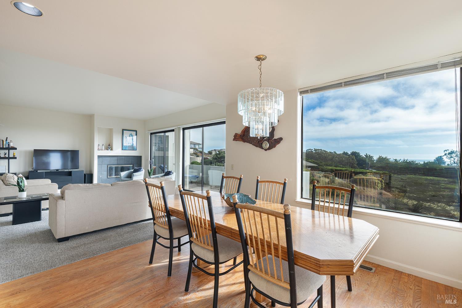 150 Cypress Loop Bodega Bay, CA 94923 - Photo 14 of 62 a view of a dining room with furniture window and wooden floor