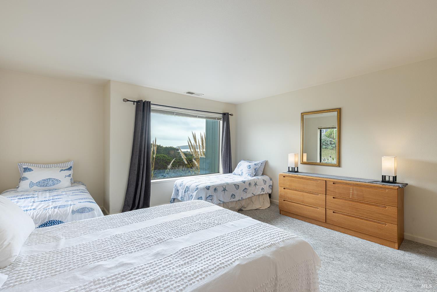 150 Cypress Loop Bodega Bay, CA 94923 - Photo 23 of 62 a bedroom with bed and window