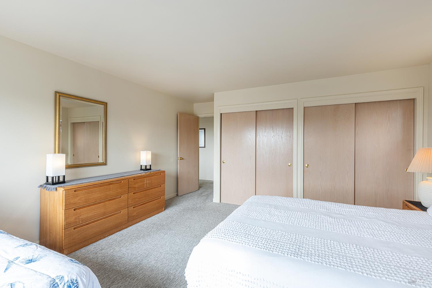 150 Cypress Loop Bodega Bay, CA 94923 - Photo 25 of 62 a bedroom with a bed and a dresser