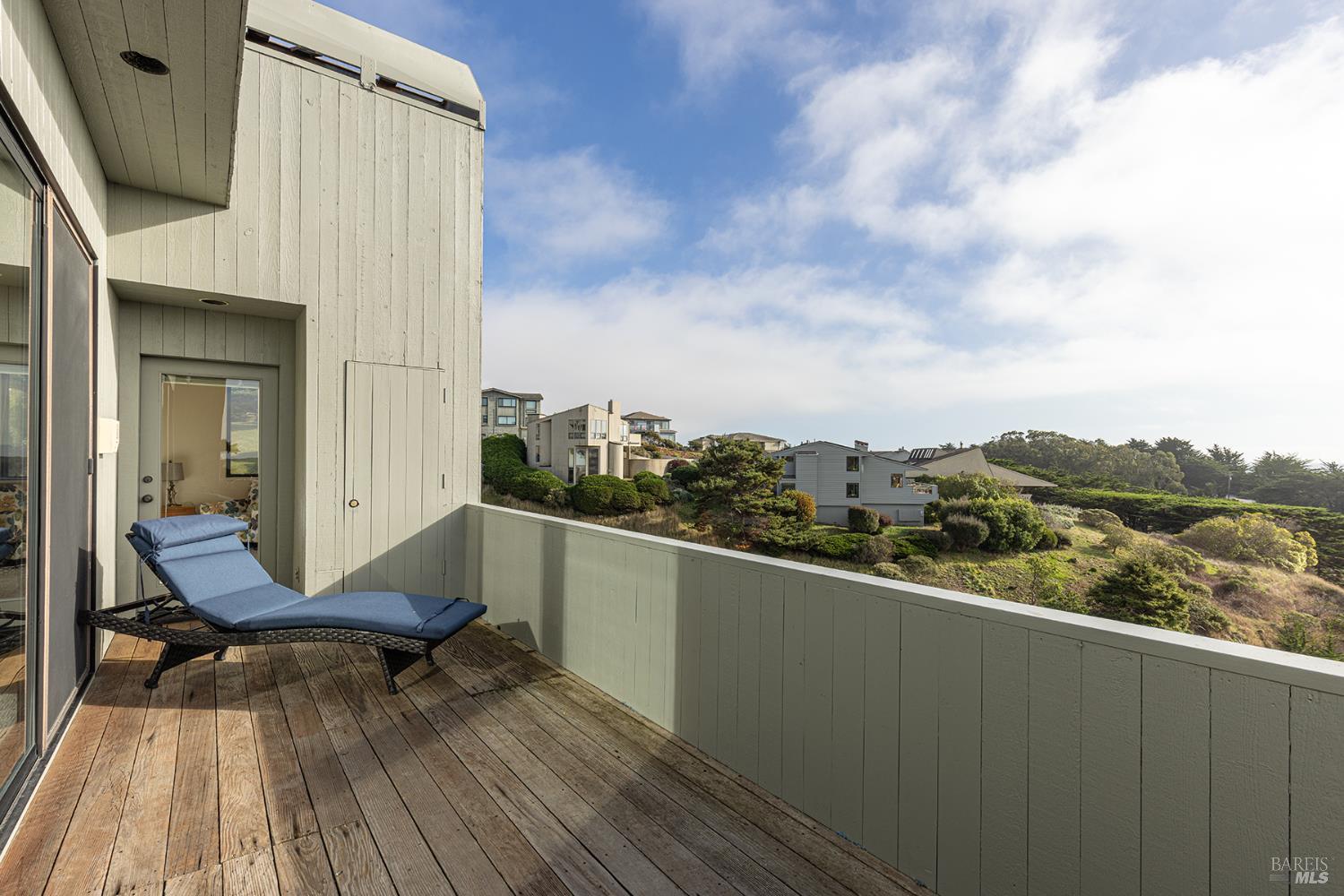 150 Cypress Loop Bodega Bay, CA 94923 - Photo 33 of 62 a view of balcony with furniture and wooden floor