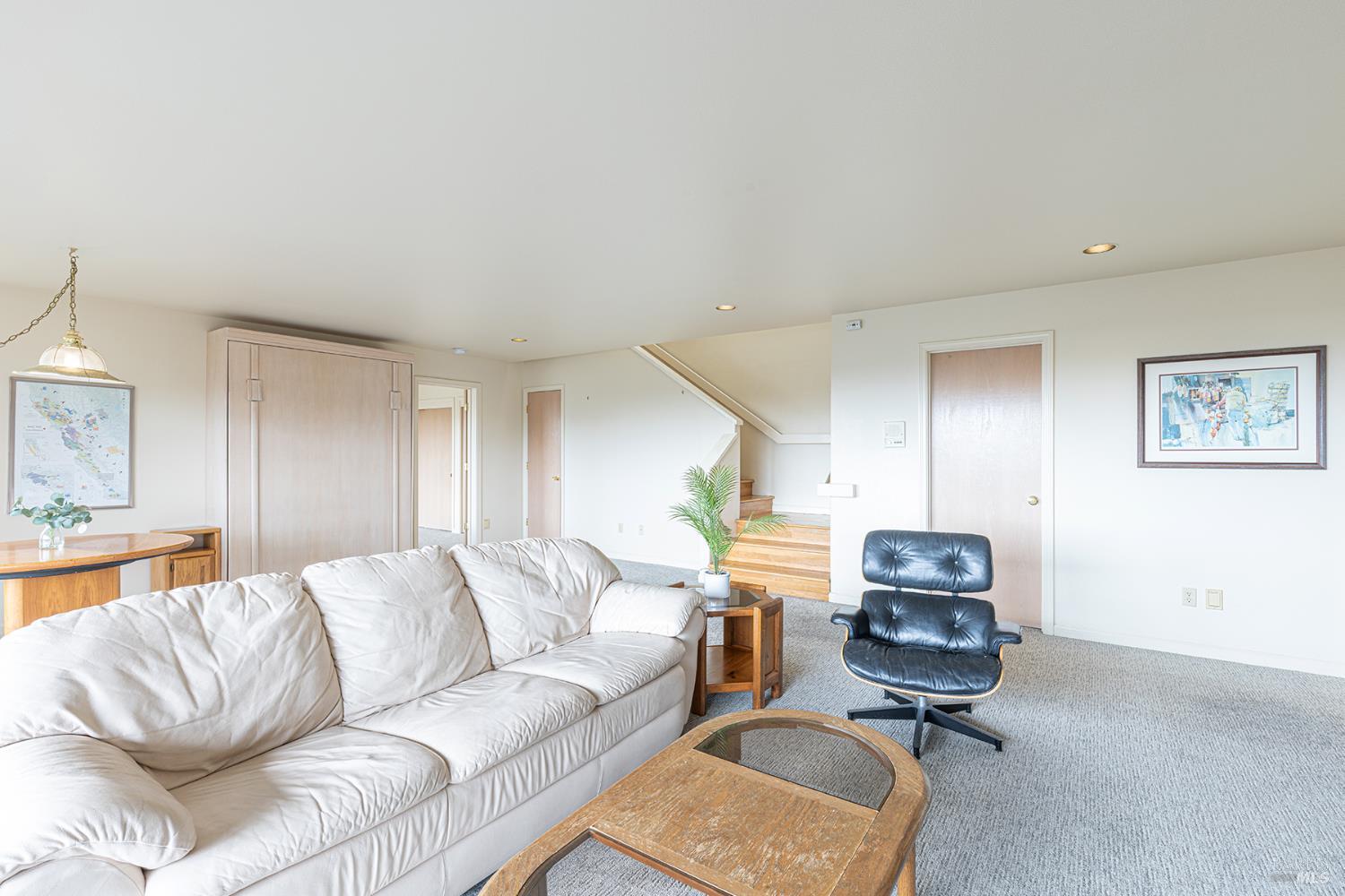 150 Cypress Loop Bodega Bay, CA 94923 - Photo 37 of 62 a living room with furniture a couch and kitchen view
