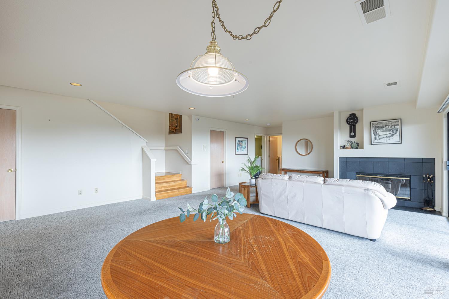 150 Cypress Loop Bodega Bay, CA 94923 - Photo 39 of 62 a bedroom with a bed and dresser with wooden floor