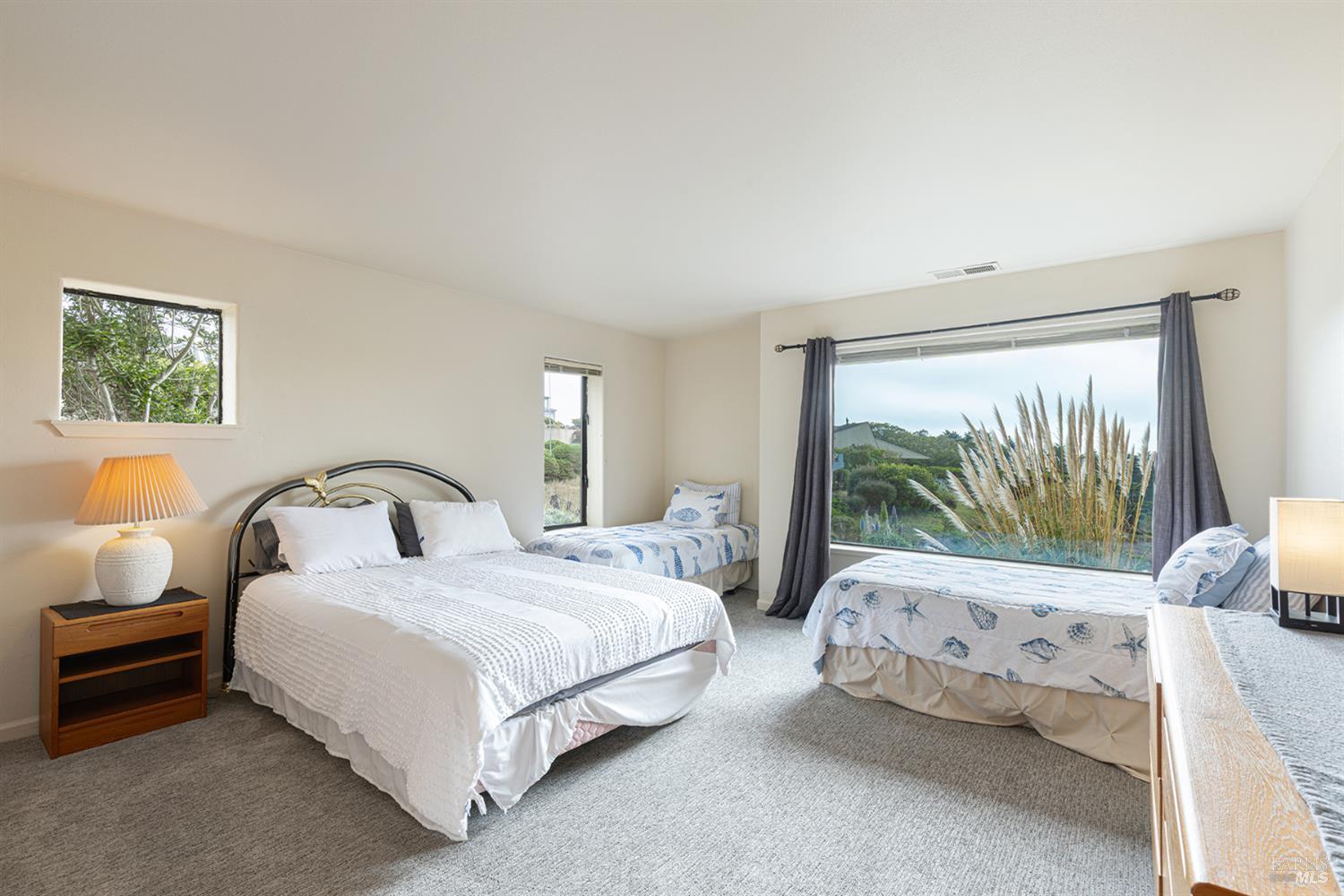 150 Cypress Loop Bodega Bay, CA 94923 - Photo 41 of 62 a bedroom with bed and a large window