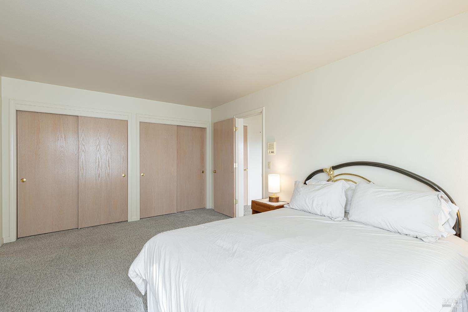 150 Cypress Loop Bodega Bay, CA 94923 - Photo 44 of 62 a bedroom with a bed and a dresser