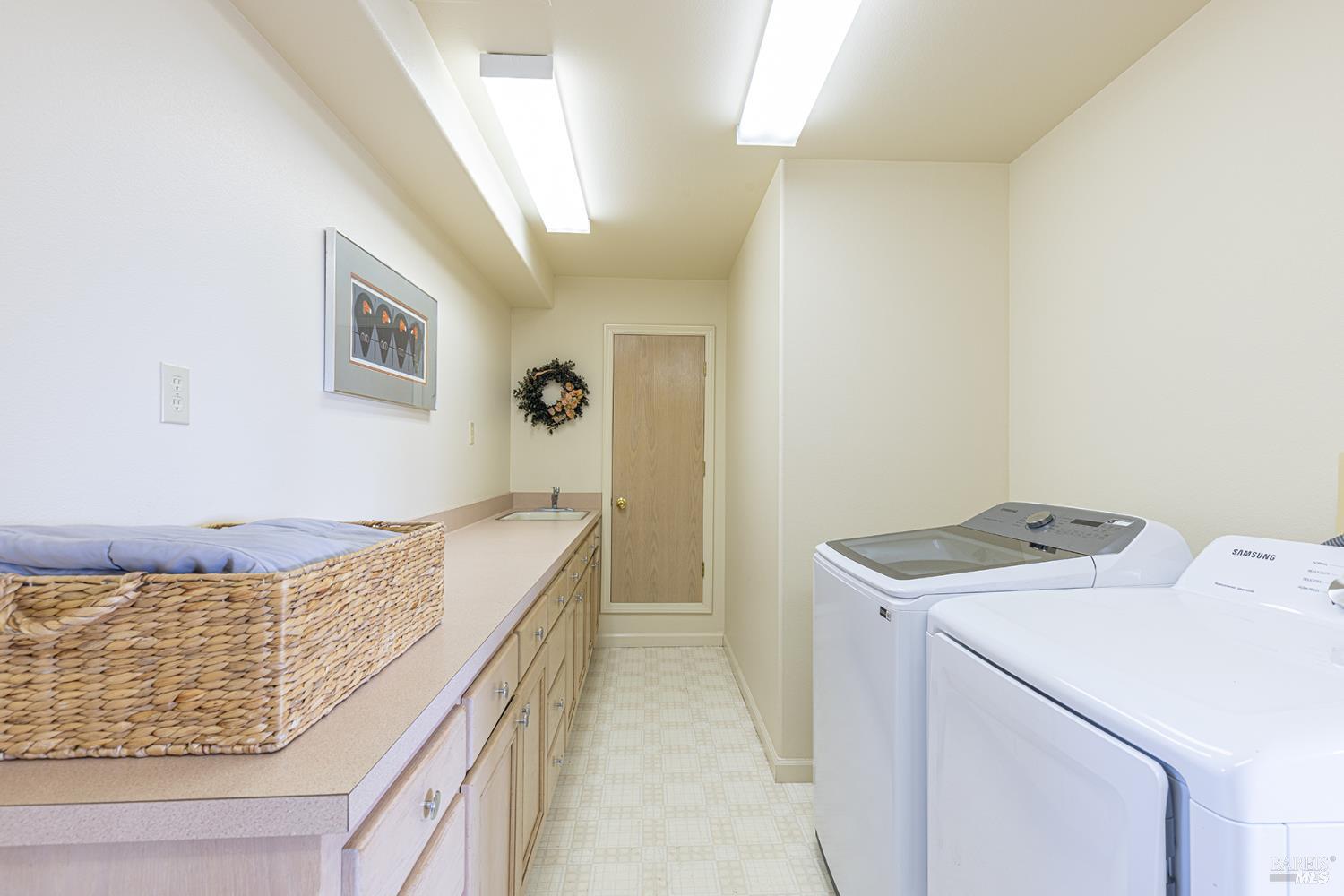 150 Cypress Loop Bodega Bay, CA 94923 - Photo 47 of 62 a utility room with washer and dryer