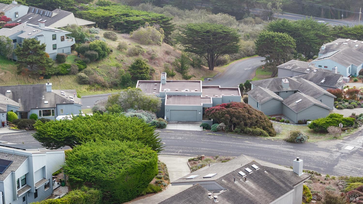 150 Cypress Loop Bodega Bay, CA 94923 - Photo 49 of 62 an aerial view of a house with a garden