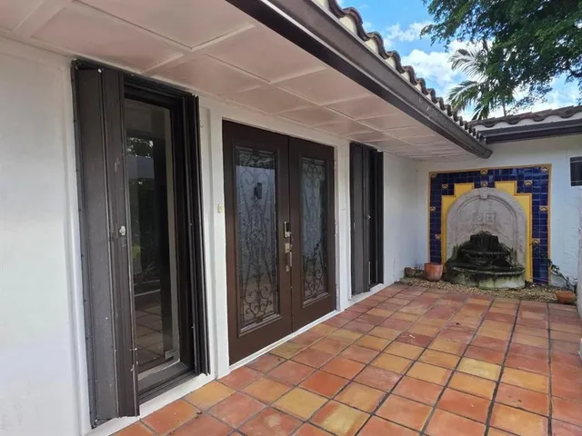 a view of a backyard of a house