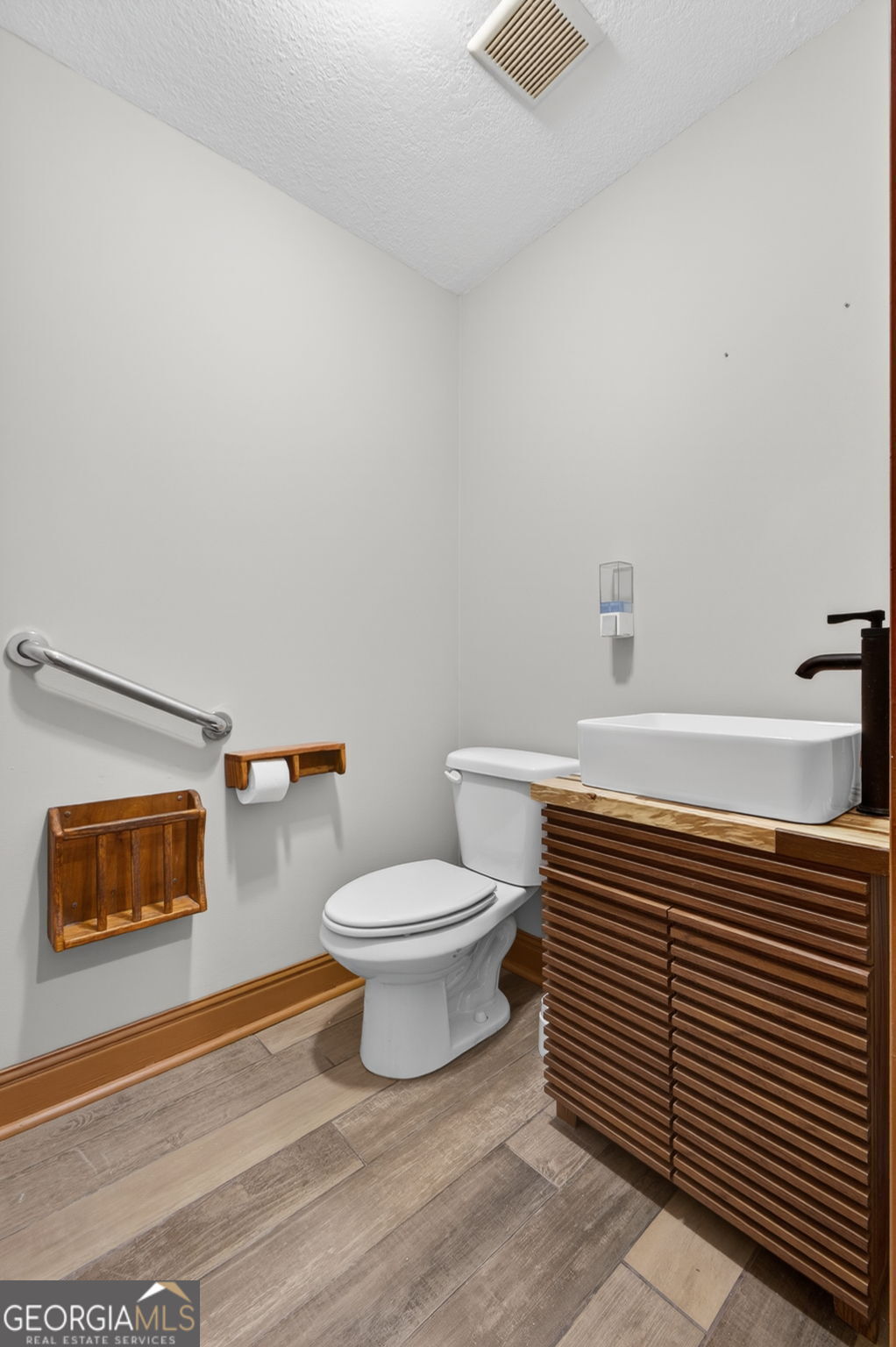 916 Highway 36 Barnesville, GA 30204 - Photo 11 of 81 a bathroom with a toilet and a shower