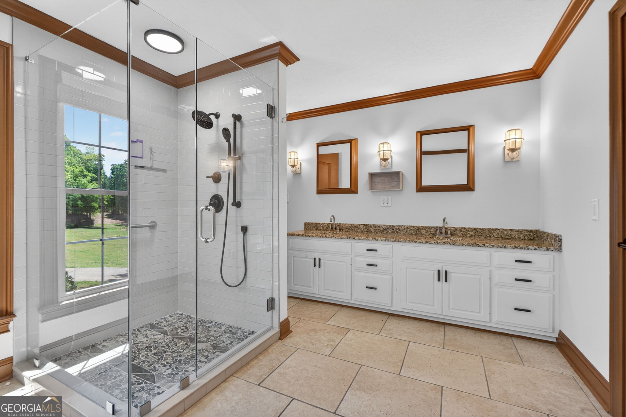 916 Highway 36 Barnesville, GA 30204 - Photo 14 of 81 a spacious bathroom with a granite countertop sink mirror and shower