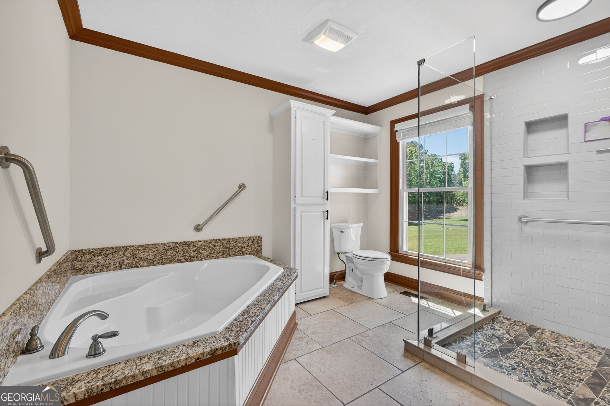 916 Highway 36 Barnesville, GA 30204 - Photo 15 of 81 a bathroom with a tub and a shower