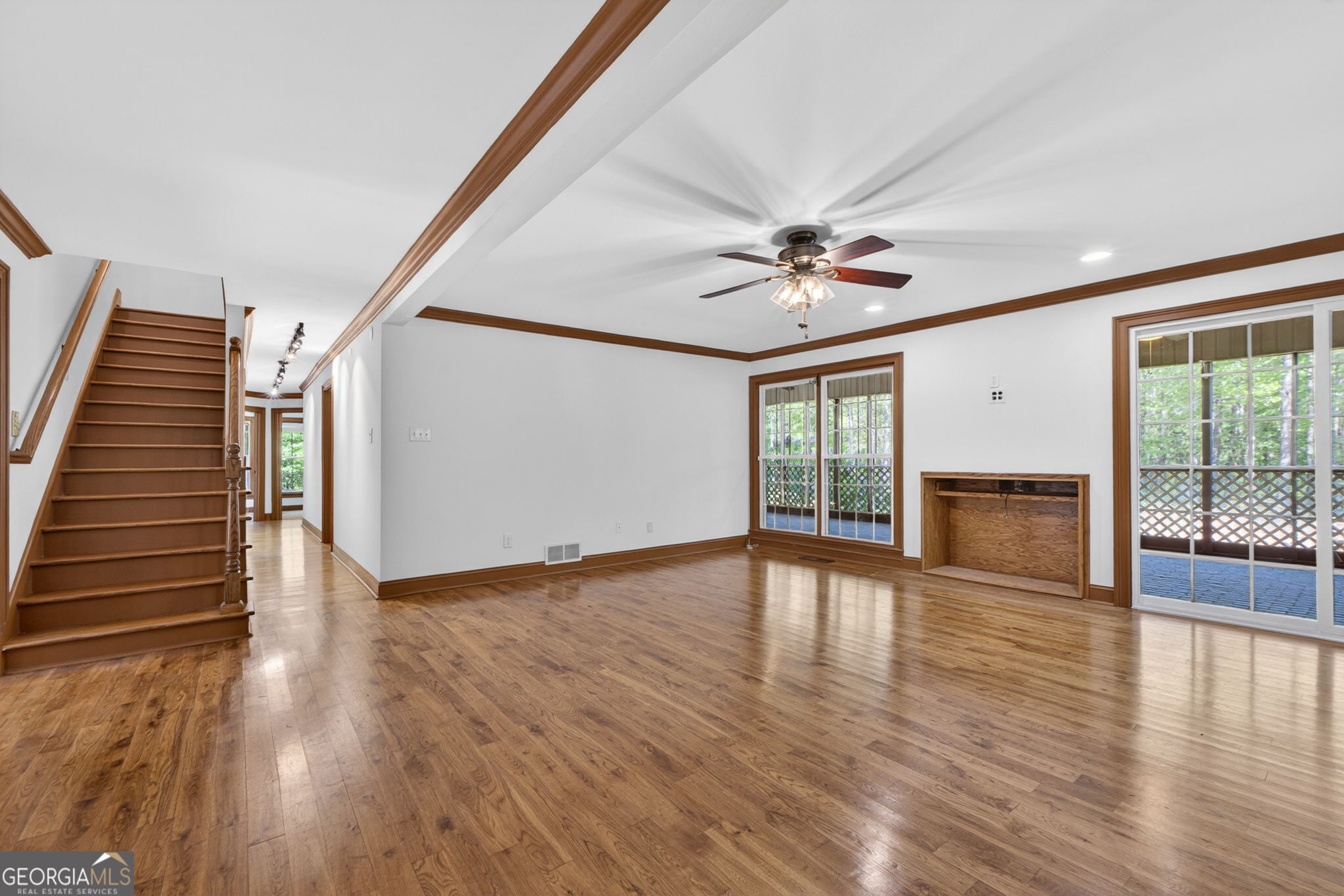 916 Highway 36 Barnesville, GA 30204 - Photo 29 of 81 wooden floor in an empty room with a window