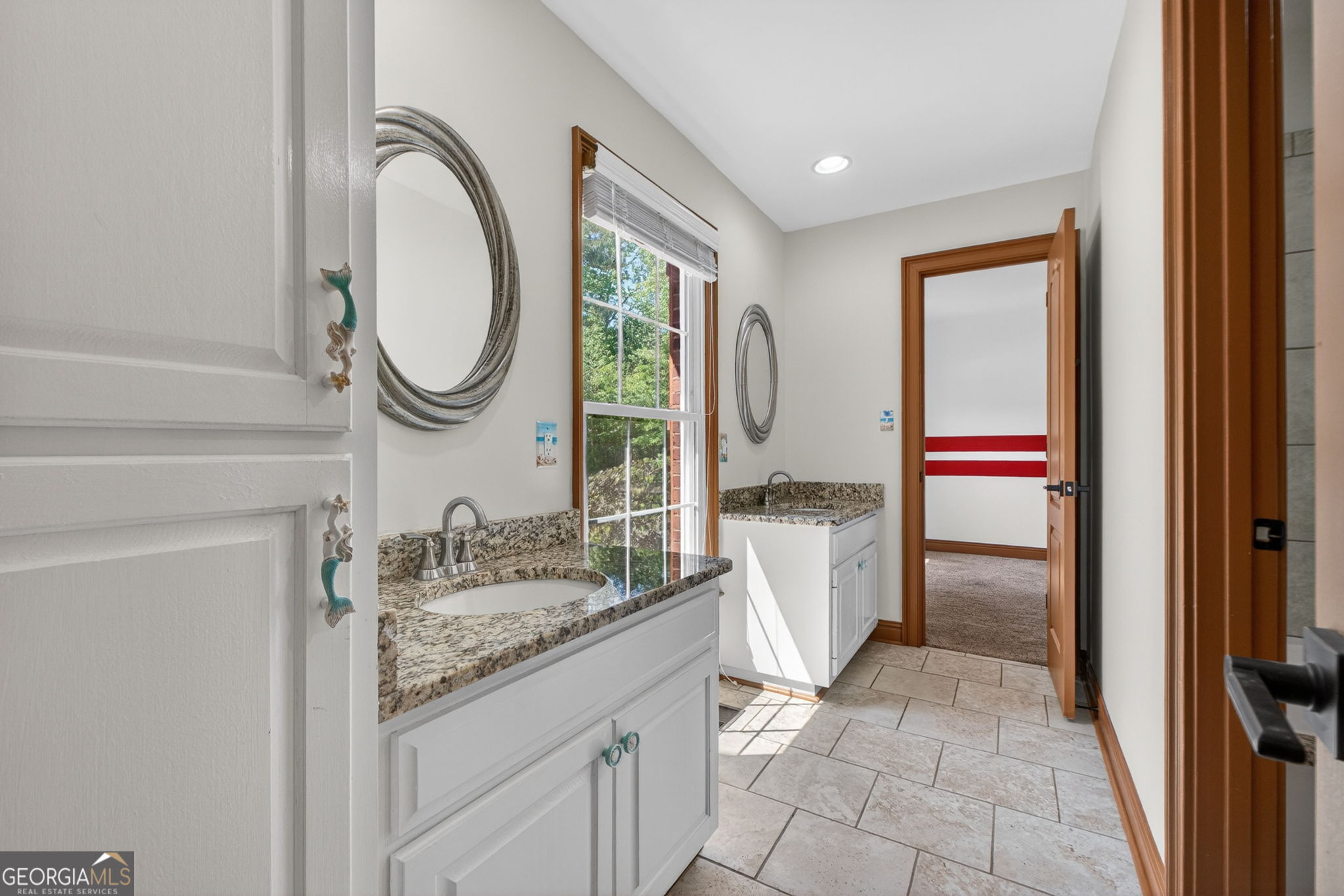 916 Highway 36 Barnesville, GA 30204 - Photo 36 of 81 a bathroom with a granite countertop sink and a mirror