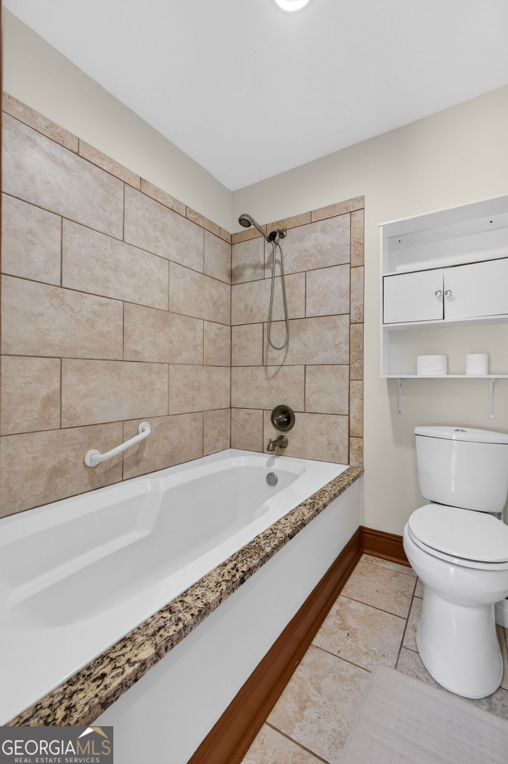 916 Highway 36 Barnesville, GA 30204 - Photo 37 of 81 a bathroom with a bathtub and a toilet