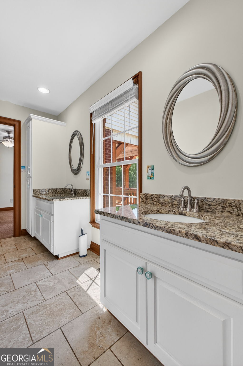916 Highway 36 Barnesville, GA 30204 - Photo 38 of 81 a bathroom with a granite countertop sink and a mirror