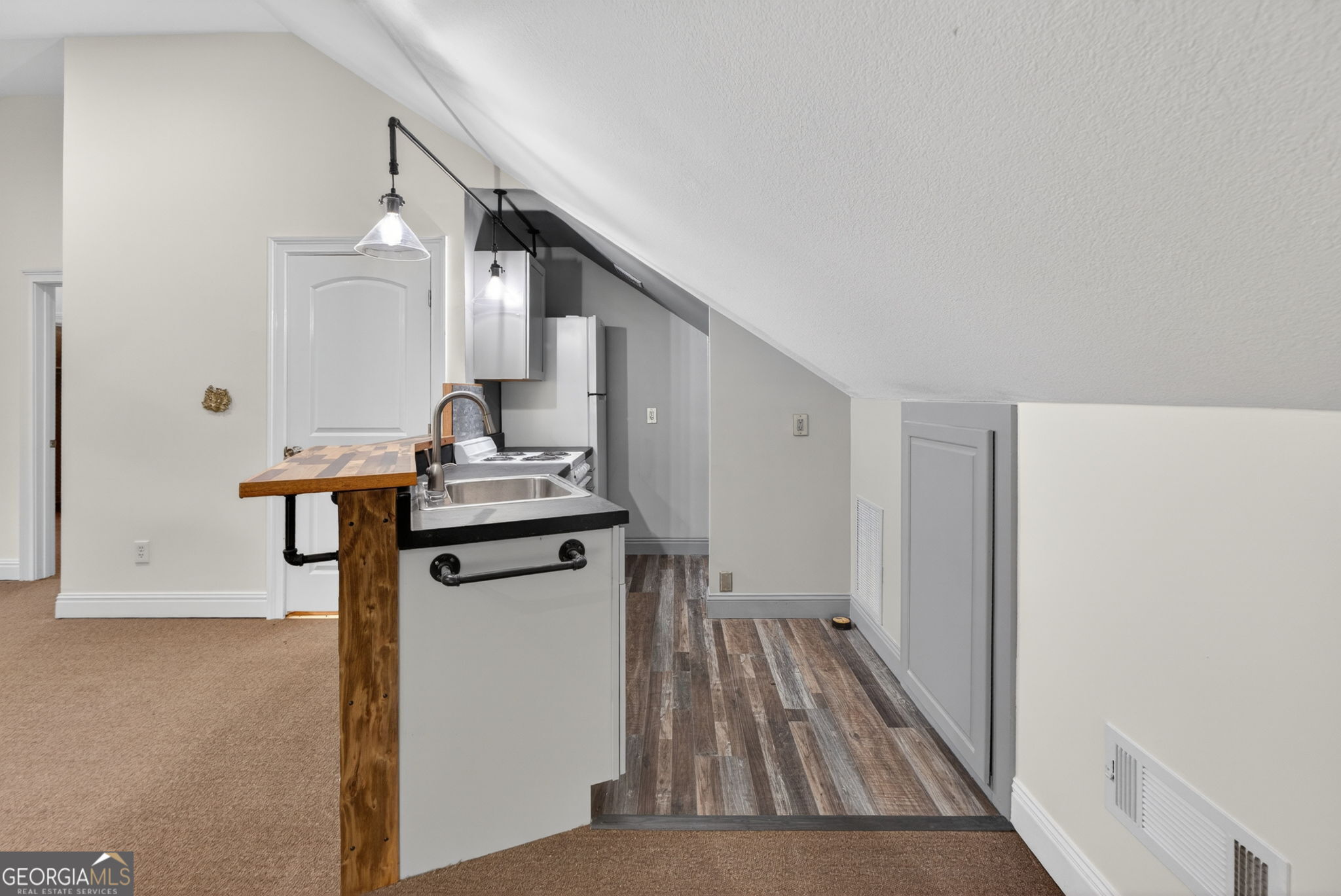 916 Highway 36 Barnesville, GA 30204 - Photo 52 of 81 a view of a kitchen from a hallway