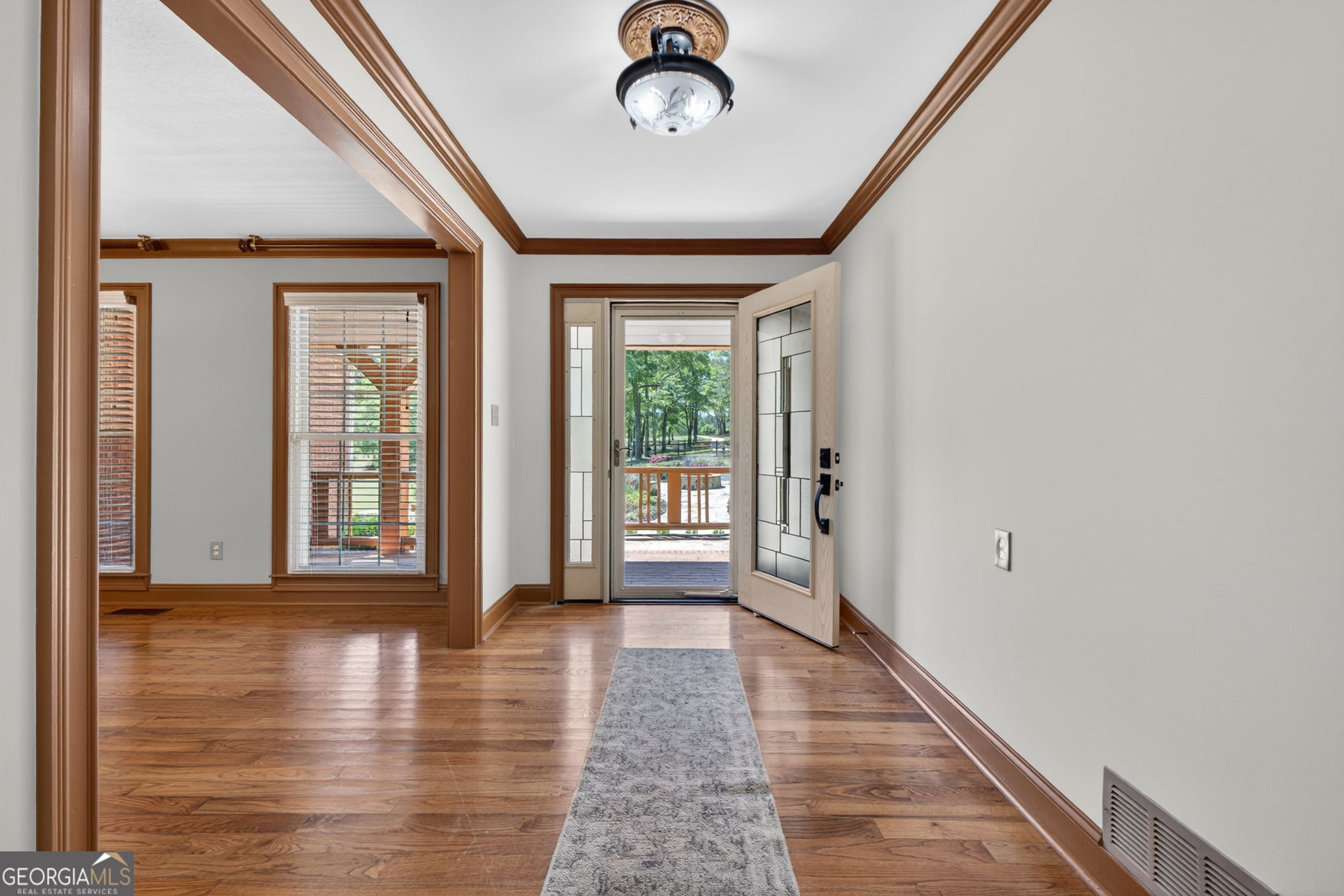 916 Highway 36 Barnesville, GA 30204 - Photo 6 of 81 a view of an entryway with wooden floor