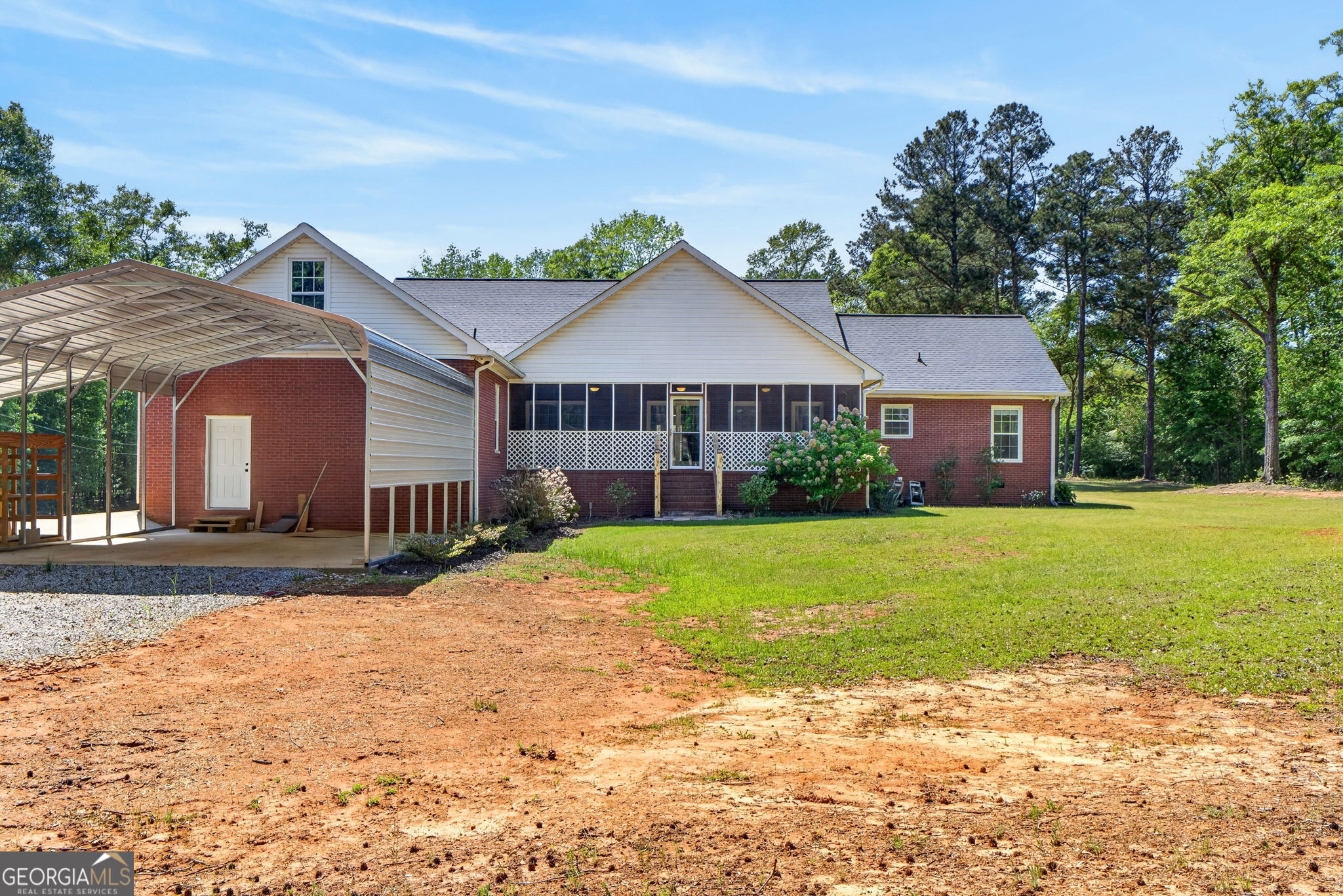 916 Highway 36 Barnesville, GA 30204 - Photo 66 of 81 a front view of a house with a yard