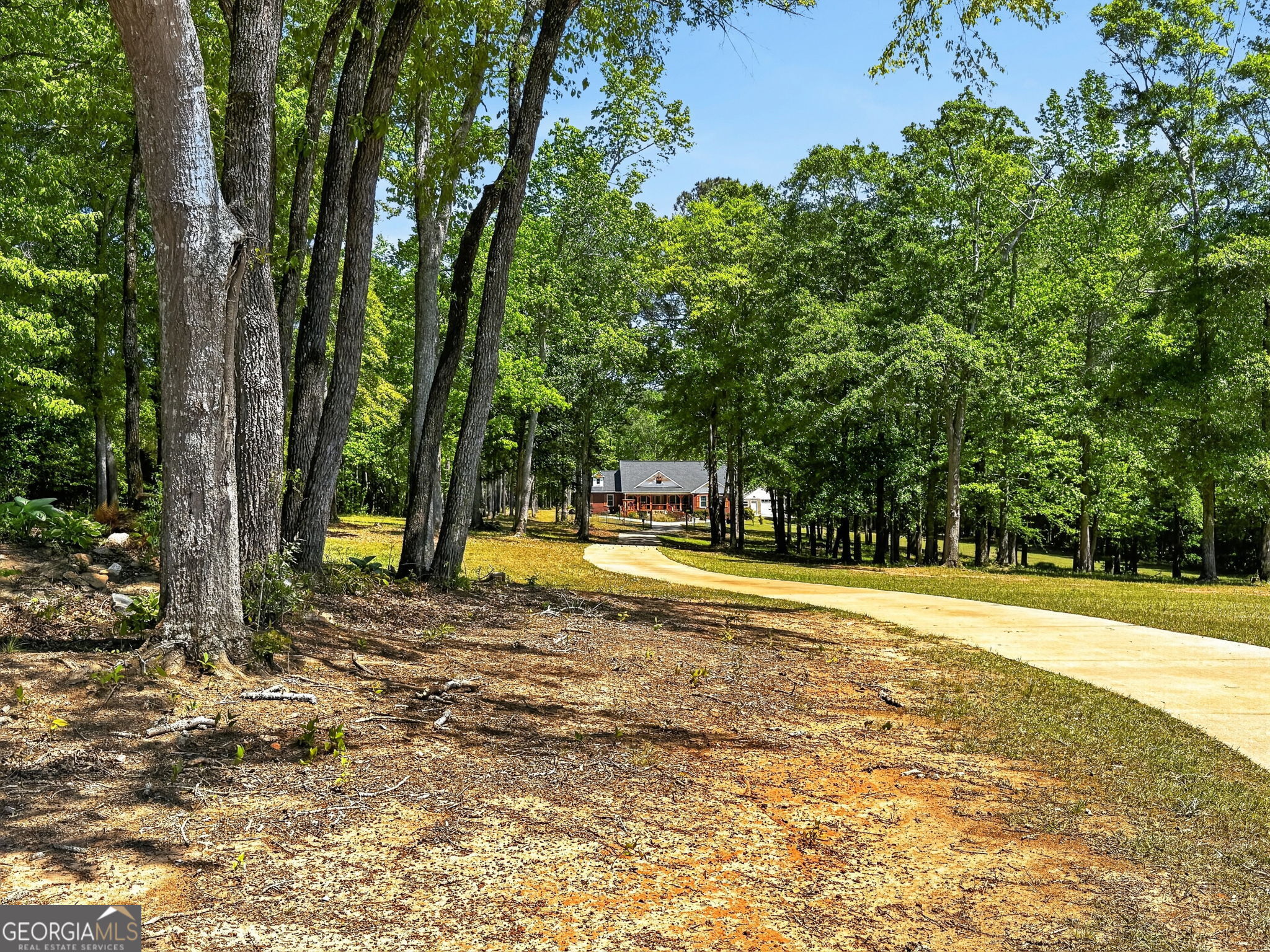 916 Highway 36 Barnesville, GA 30204 - Photo 75 of 81 a view of a house with a yard