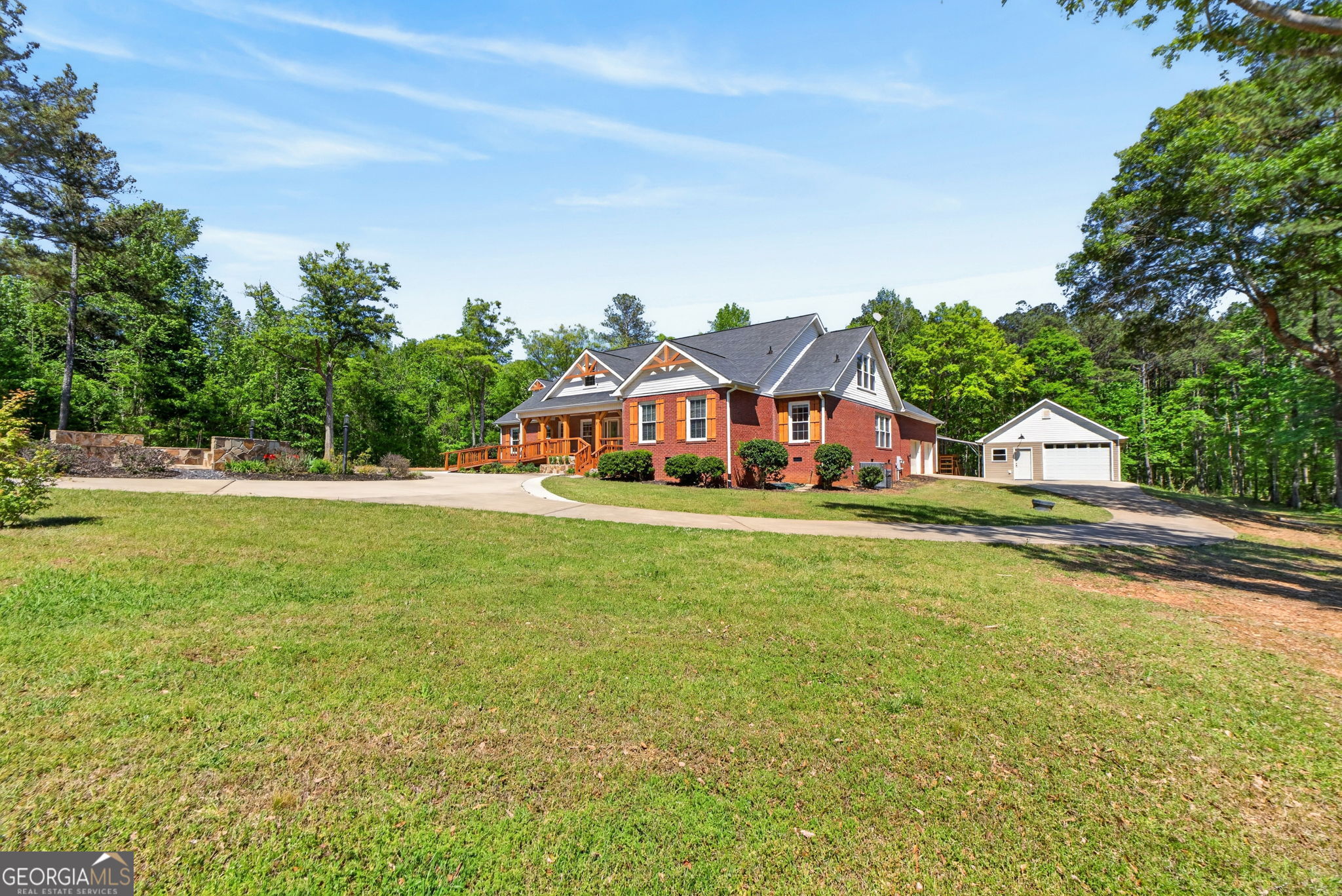 916 Highway 36 Barnesville, GA 30204 - Photo 77 of 81 a front view of house with yard and trees in the background