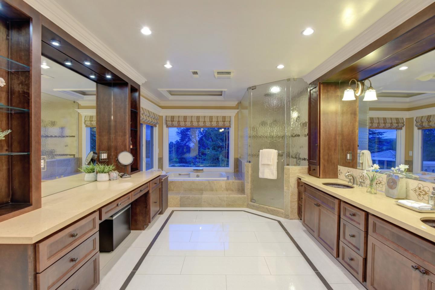 14000 Pike Road Saratoga, CA 95070 - Photo 22 of 48 a spacious bathroom with a tub sink shower and mirror