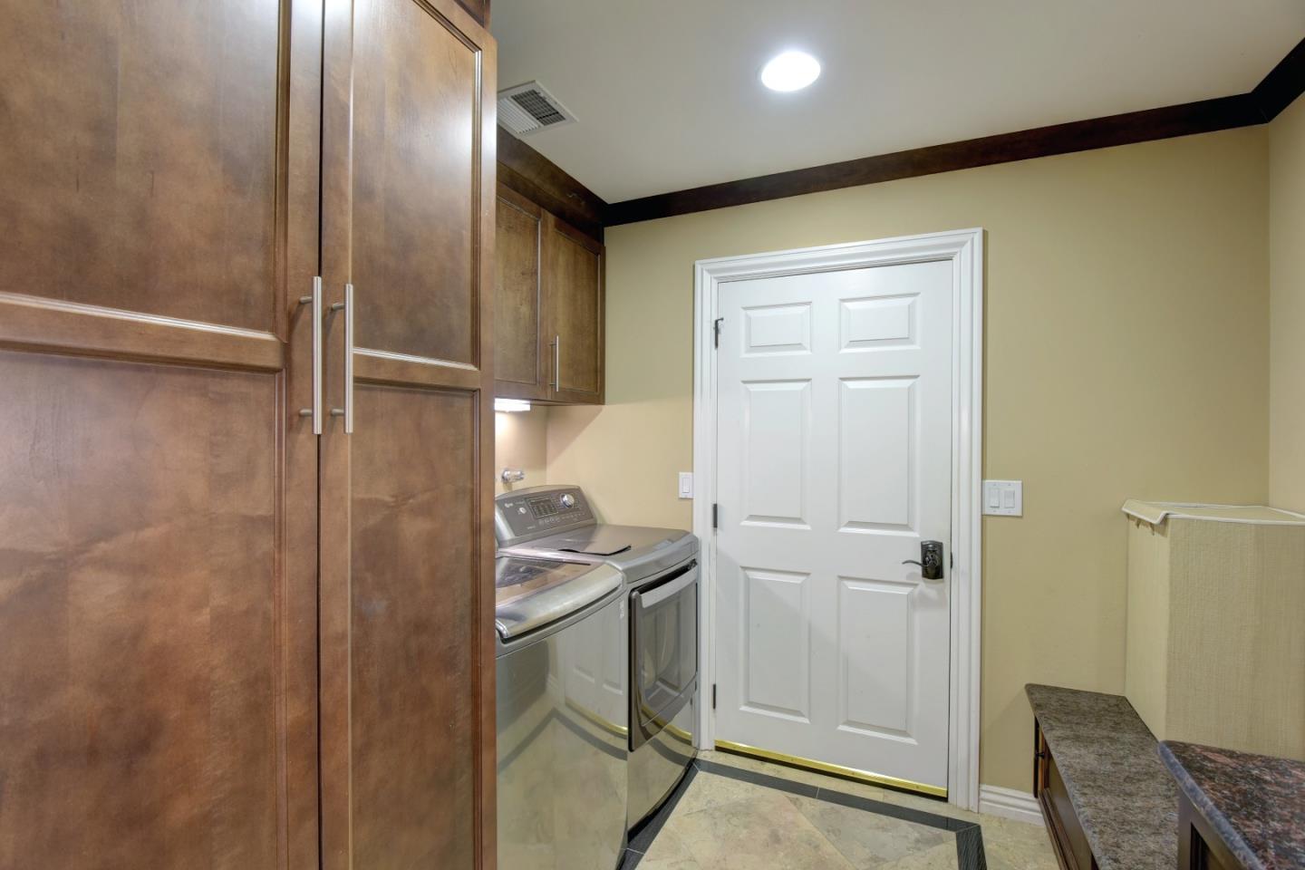 14000 Pike Road Saratoga, CA 95070 - Photo 26 of 48 a bathroom with a sink and a mirror