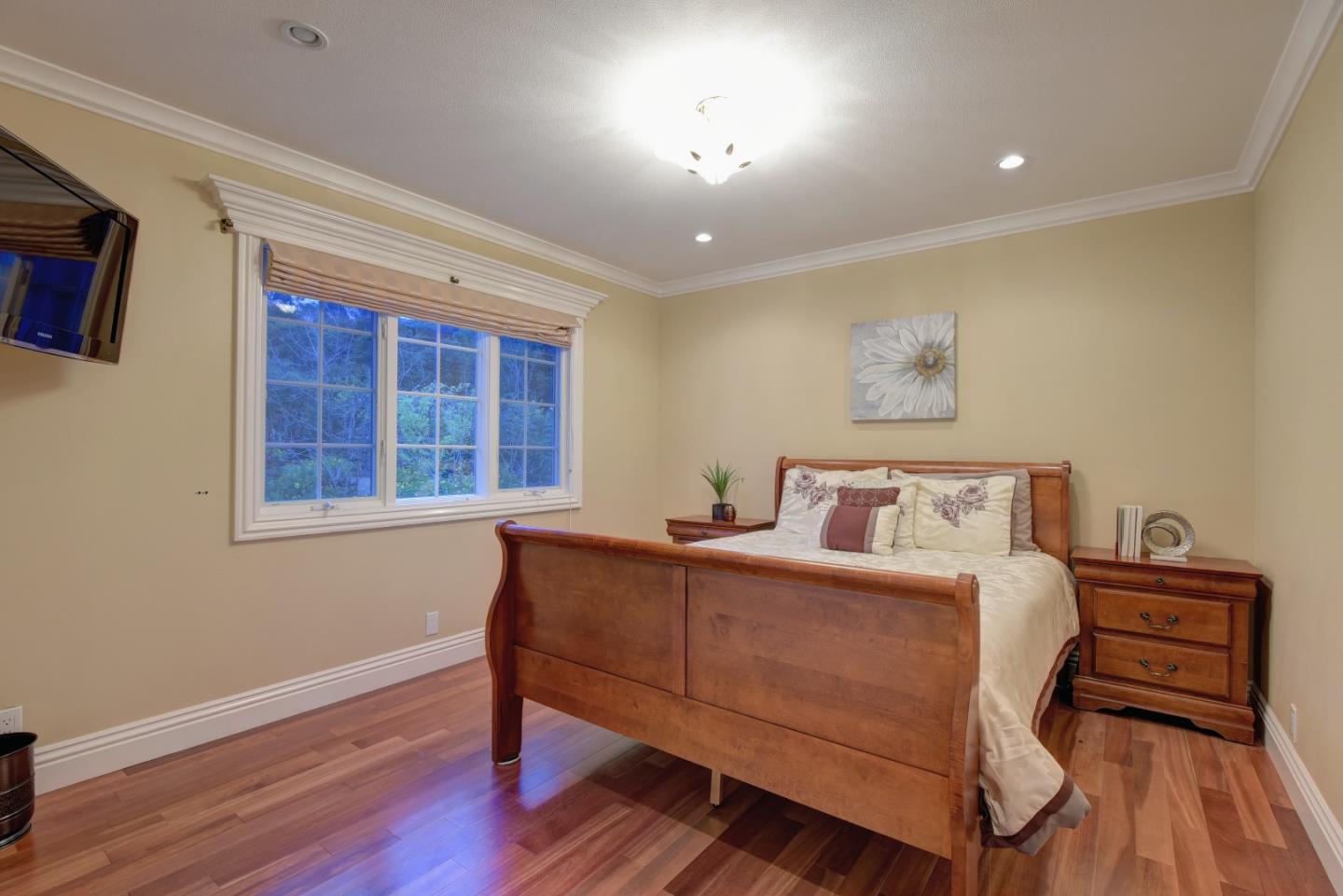 14000 Pike Road Saratoga, CA 95070 - Photo 28 of 48 a bedroom with a bed and a dresser