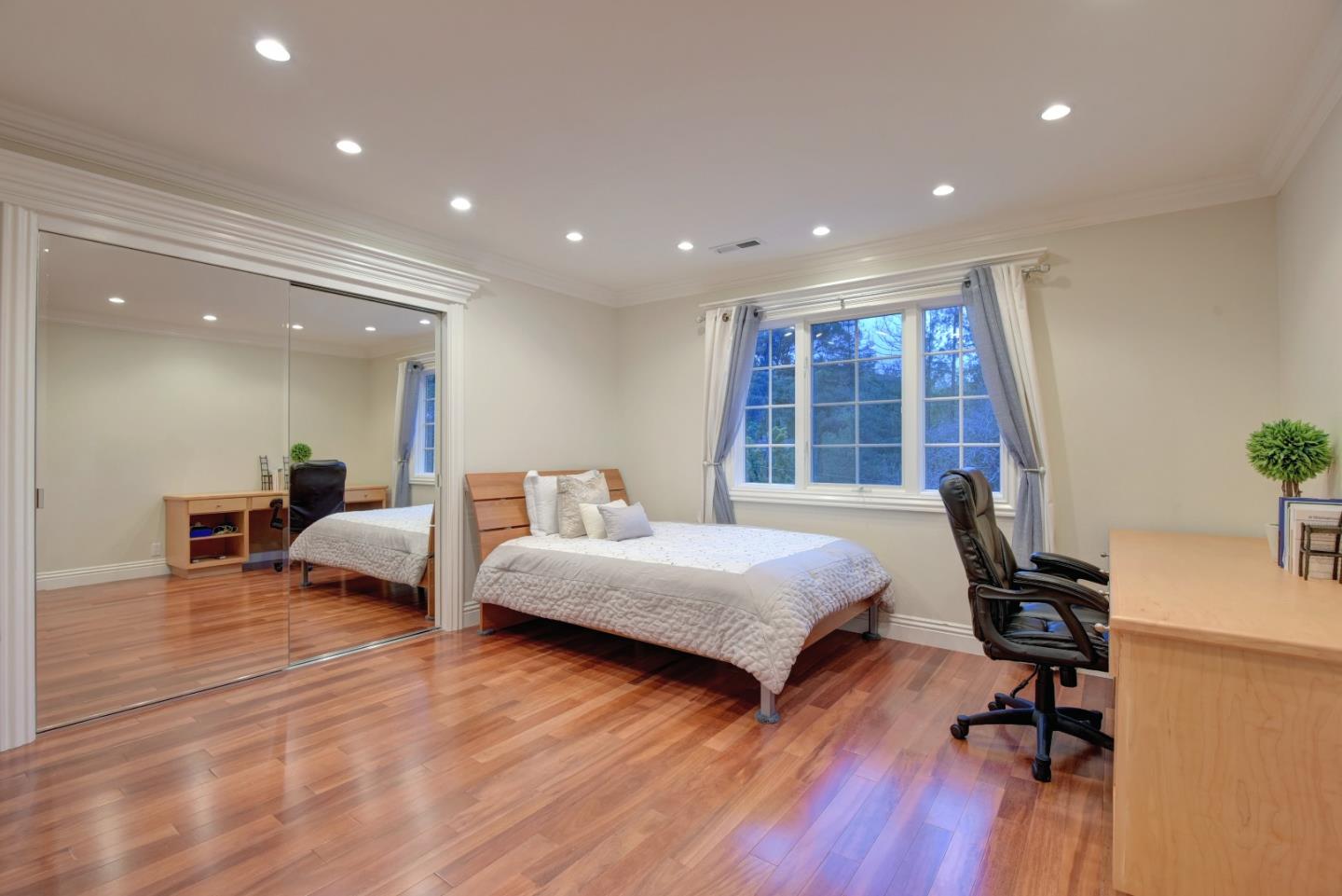 14000 Pike Road Saratoga, CA 95070 - Photo 30 of 48 a bedroom with furniture and a wooden floor
