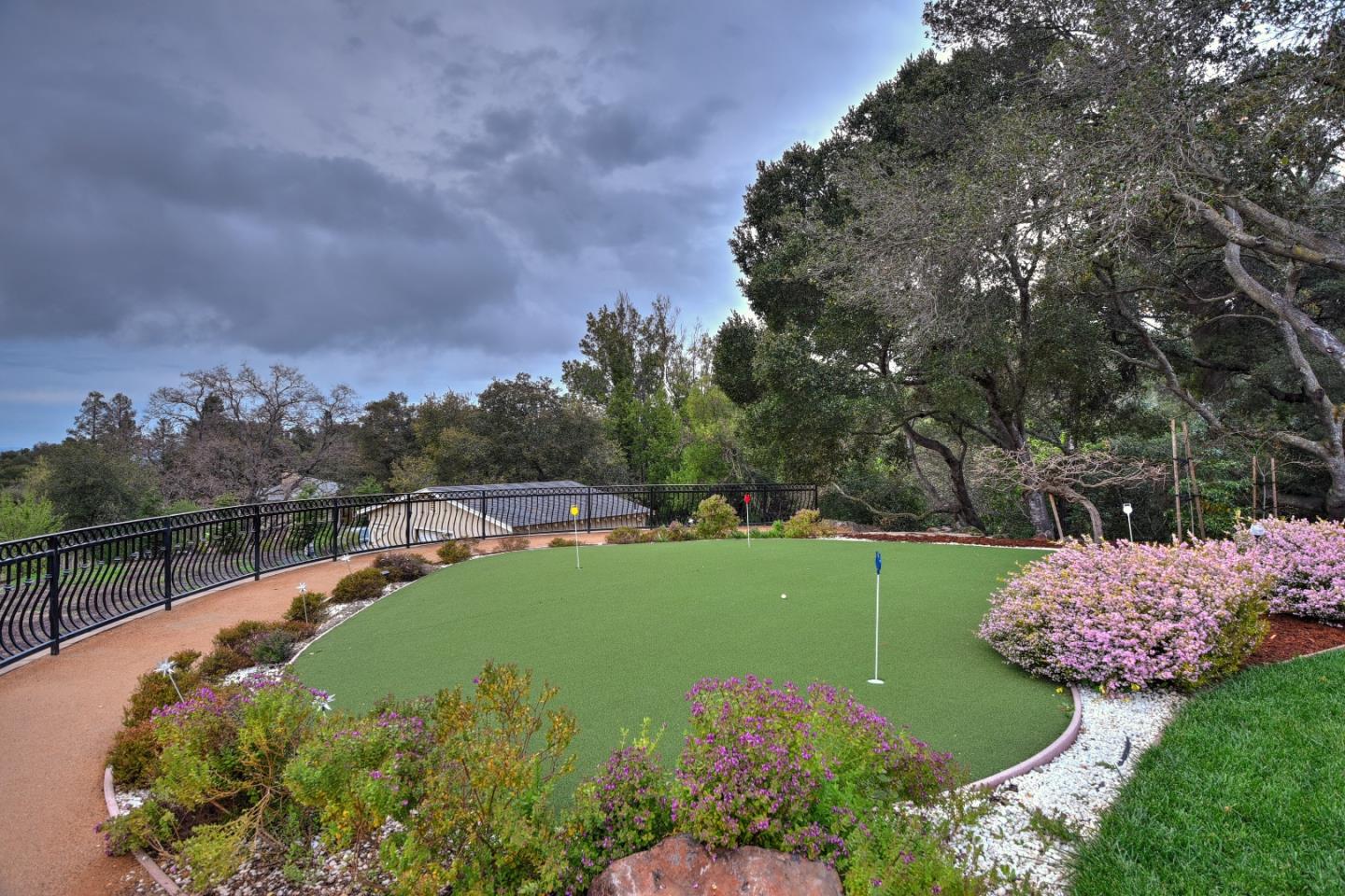 14000 Pike Road Saratoga, CA 95070 - Photo 38 of 48 a view of a garden with a fountain