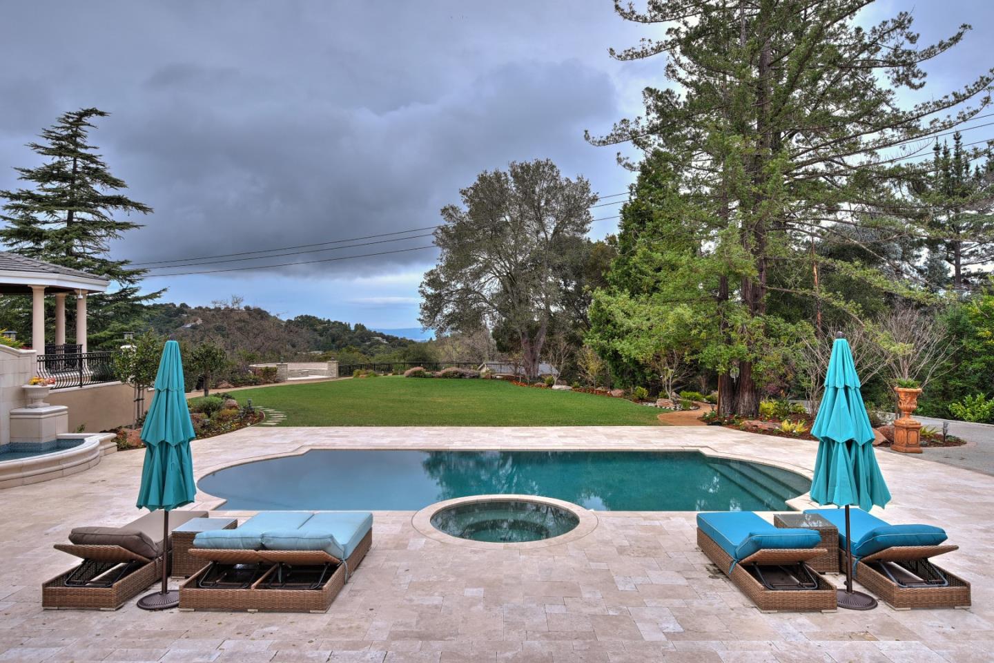 14000 Pike Road Saratoga, CA 95070 - Photo 46 of 48 a view of a swimming pool with a patio