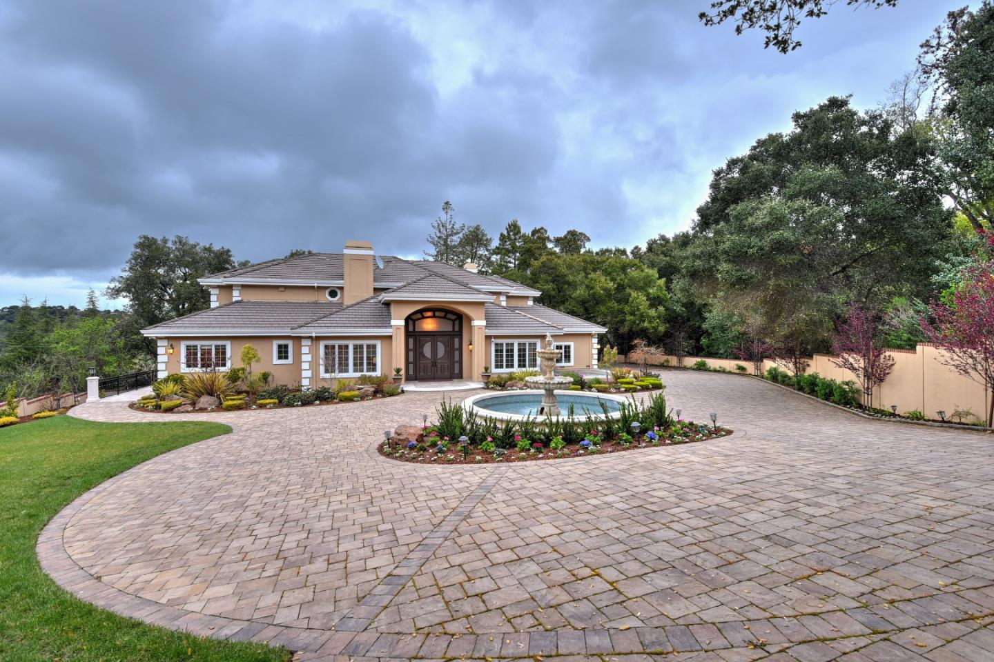 14000 Pike Road Saratoga, CA 95070 - Photo 7 of 48 a white house with a big yard and large trees