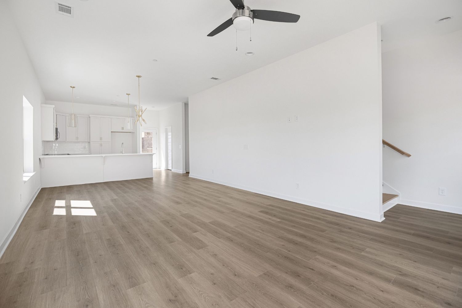 203 B Folsom Pass Spring Hill Spring Hill, TN 37174 - Photo 39 of 40 wooden floor in an empty room with a window