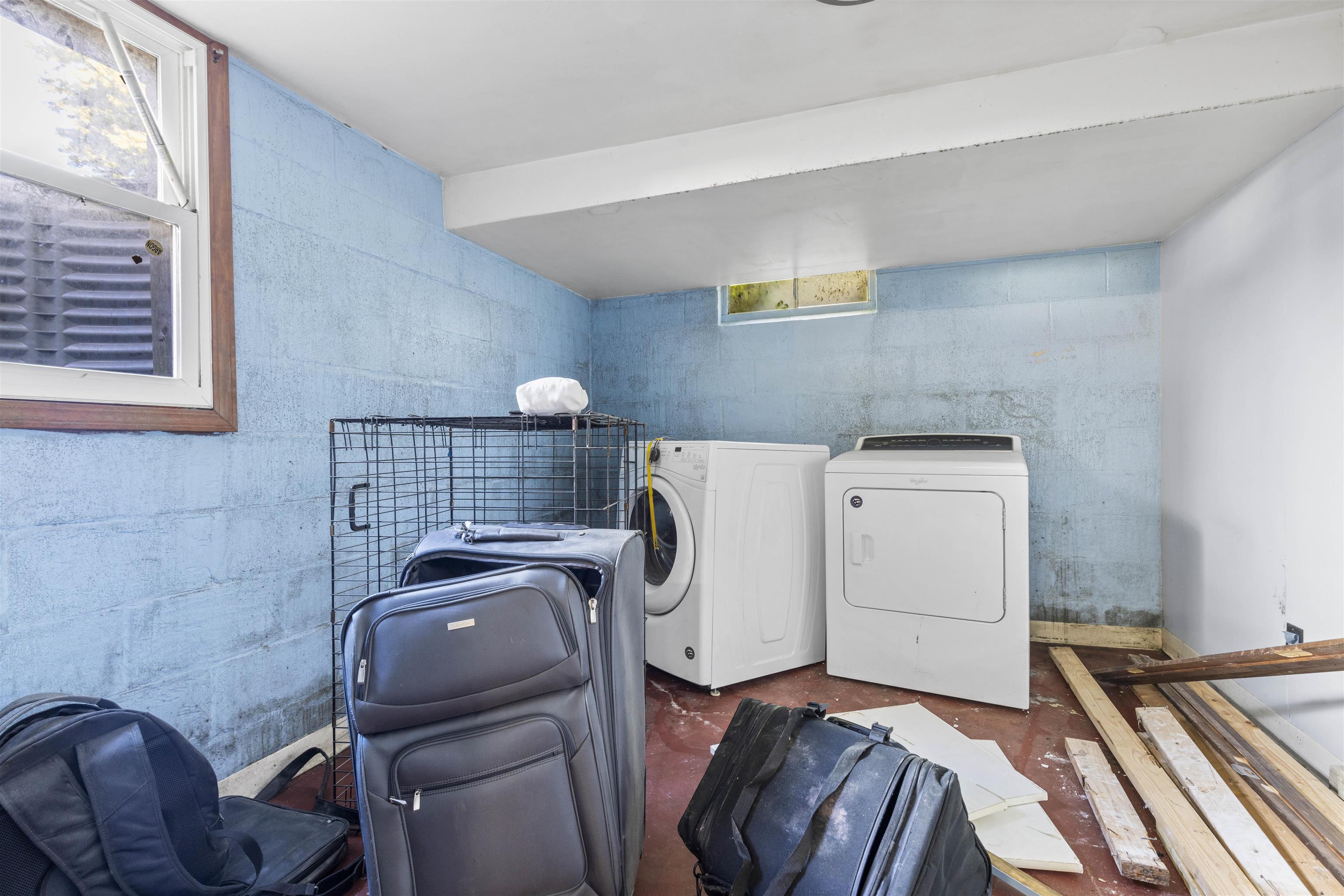 907 Woolf Court Rochelle, IL 61068 - Photo 13 of 15 a view of storage and utility room with washer and dryer