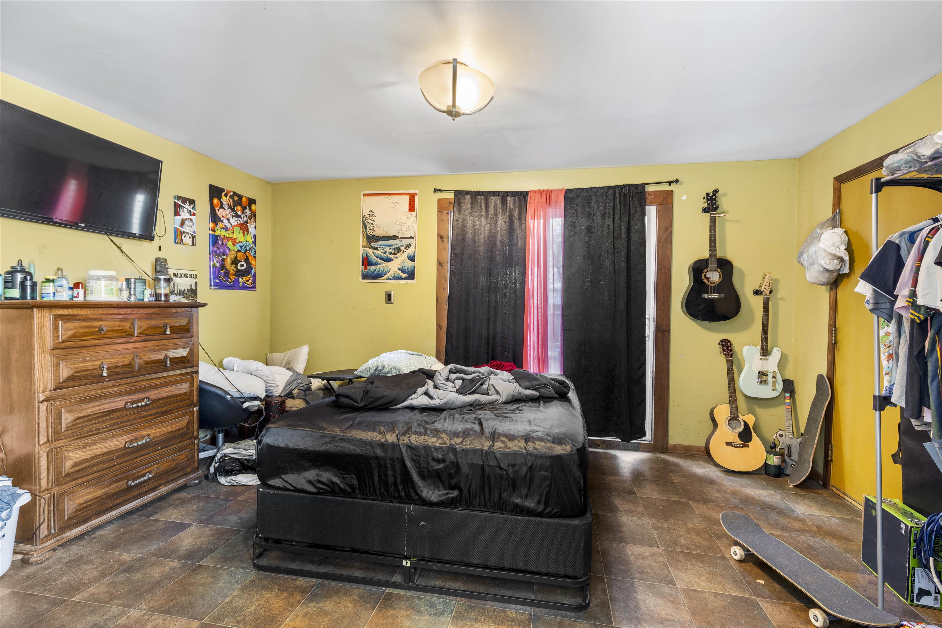907 Woolf Court Rochelle, IL 61068 - Photo 6 of 15 a bedroom with a bed and wooden floor