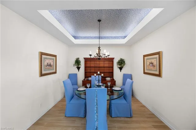 a bedroom with a bed and a lamp on table