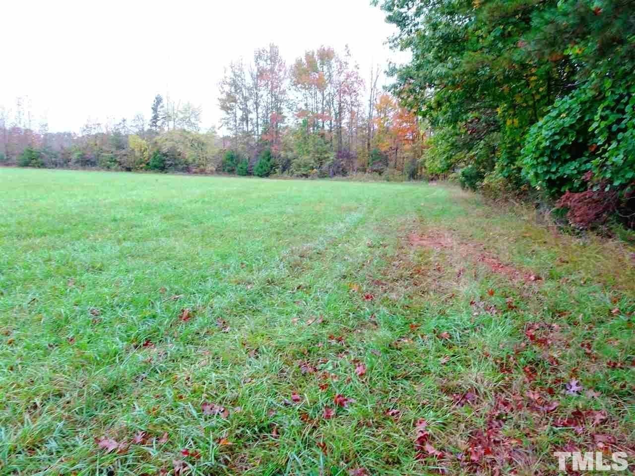 Reed Road Boydton, VA 23917 - Photo 16 of 24 a view of a grassy field with trees in the background
