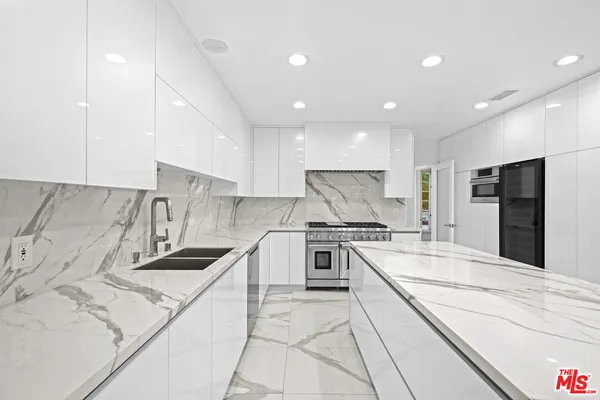 a view of an empty room with a sliding door