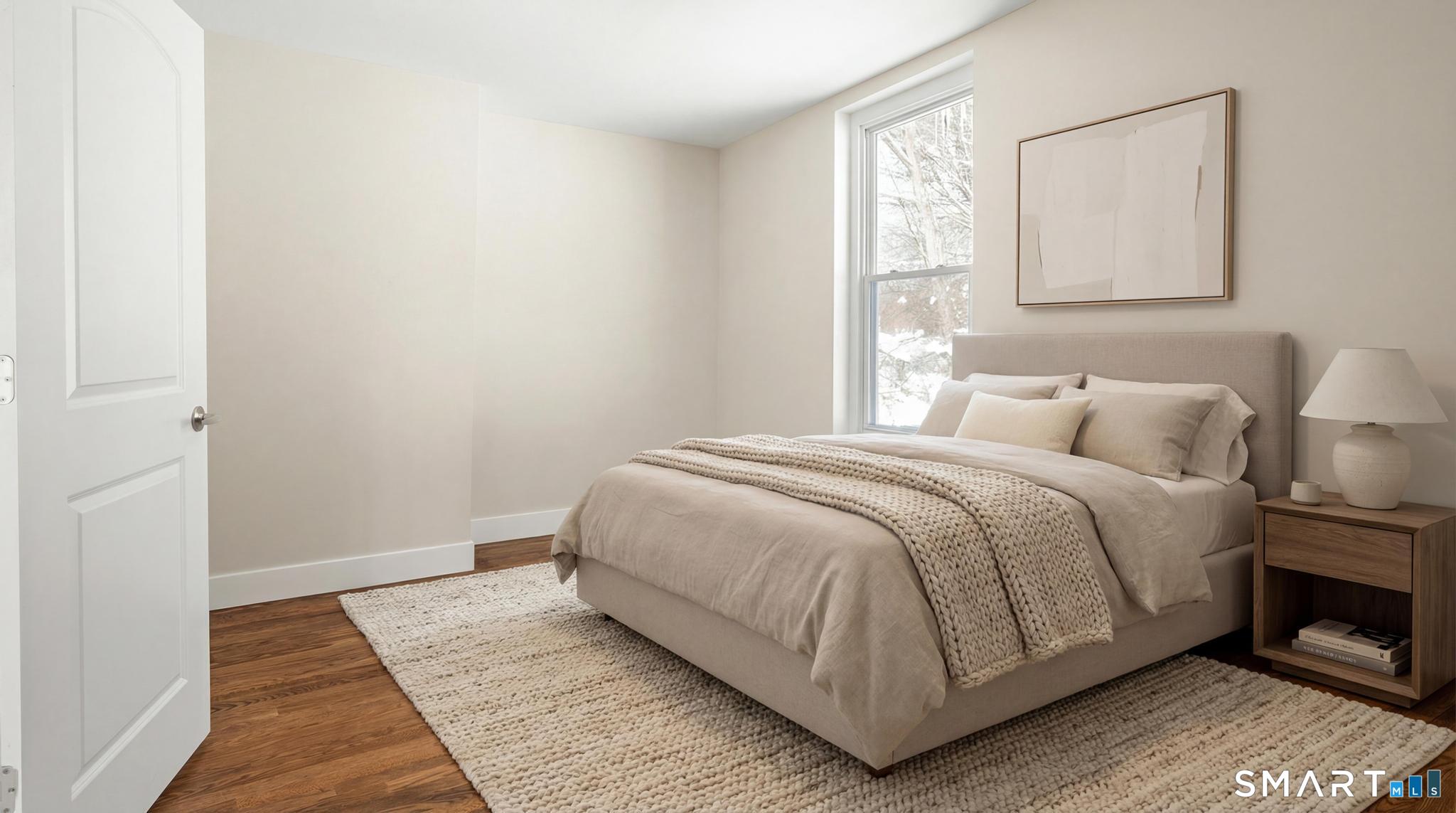 6 Juniper Ridge Drive Danbury, CT 06811 - Photo 20 of 36 a bedroom with a bed and a window