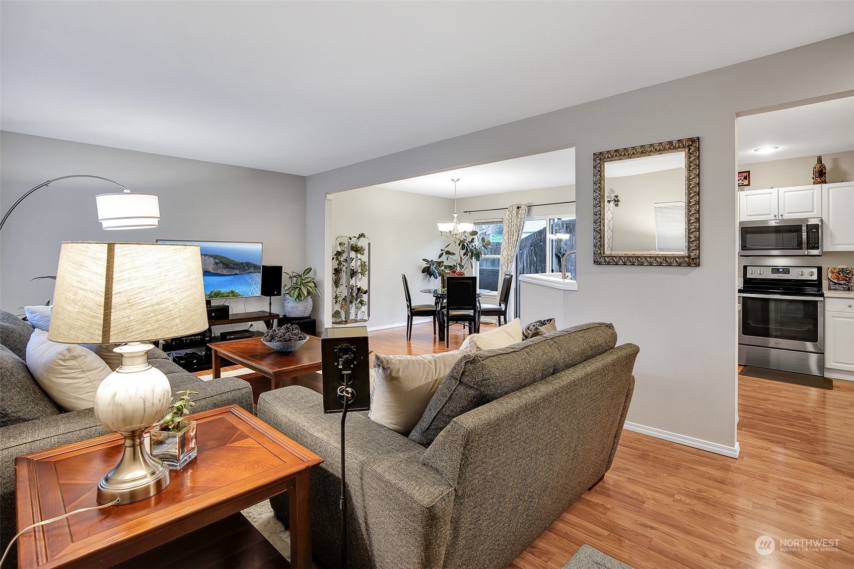 3834 Northeast 5th Place Renton, WA 98056 - Photo 11 of 39 a living room with furniture and wooden floor
